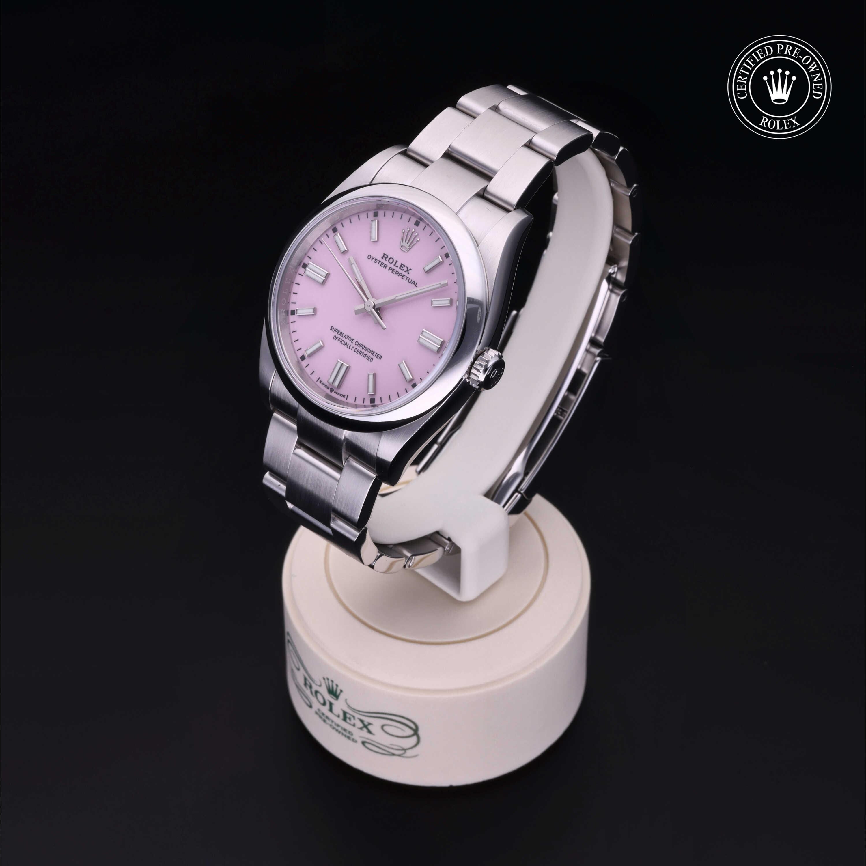 Rolex Certified Pre-owned Oyster Perpetual M126000-0008 front on black background