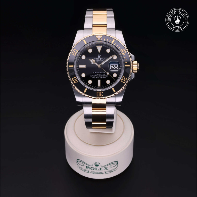 Rolex Certified Pre-owned Submariner M116613LN-0001 front on black background