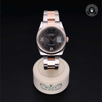 Rolex Certified Pre-owned Datejust M126201-0024 front on black background