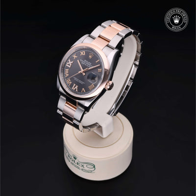 Rolex Certified Pre-owned Datejust M126201-0024 front on black background