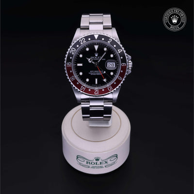 Rolex Certified Pre-owned GMT M16710-0009 front on black background