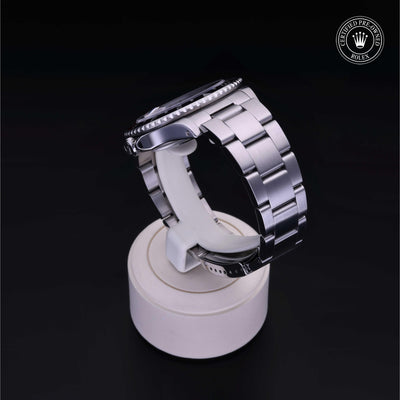 Rolex Certified Pre-owned GMT M16710-0009 front on black background