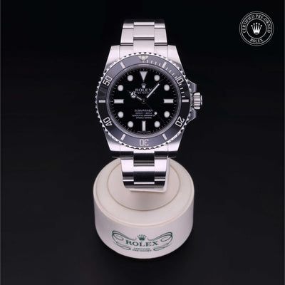 Rolex Certified Pre-owned Submariner M114060-0002 front on black background