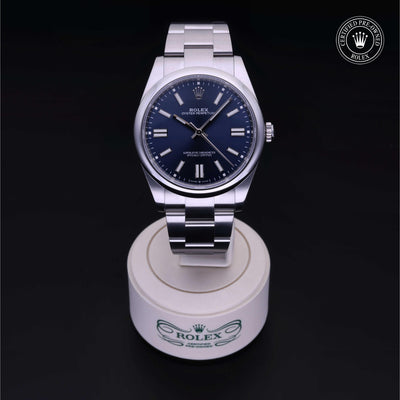 Rolex Certified Pre-owned Oyster Perpetual M124300-0003 front on black background