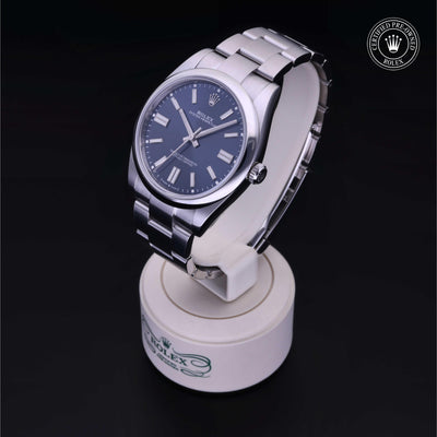 Rolex Certified Pre-owned Oyster Perpetual M124300-0003 front on black background