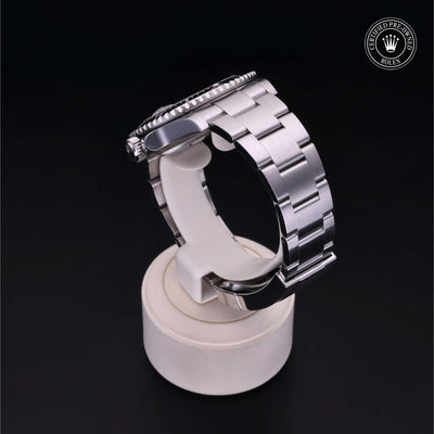 Rolex Certified Pre-owned Submariner M126610LN-0001 front on black background