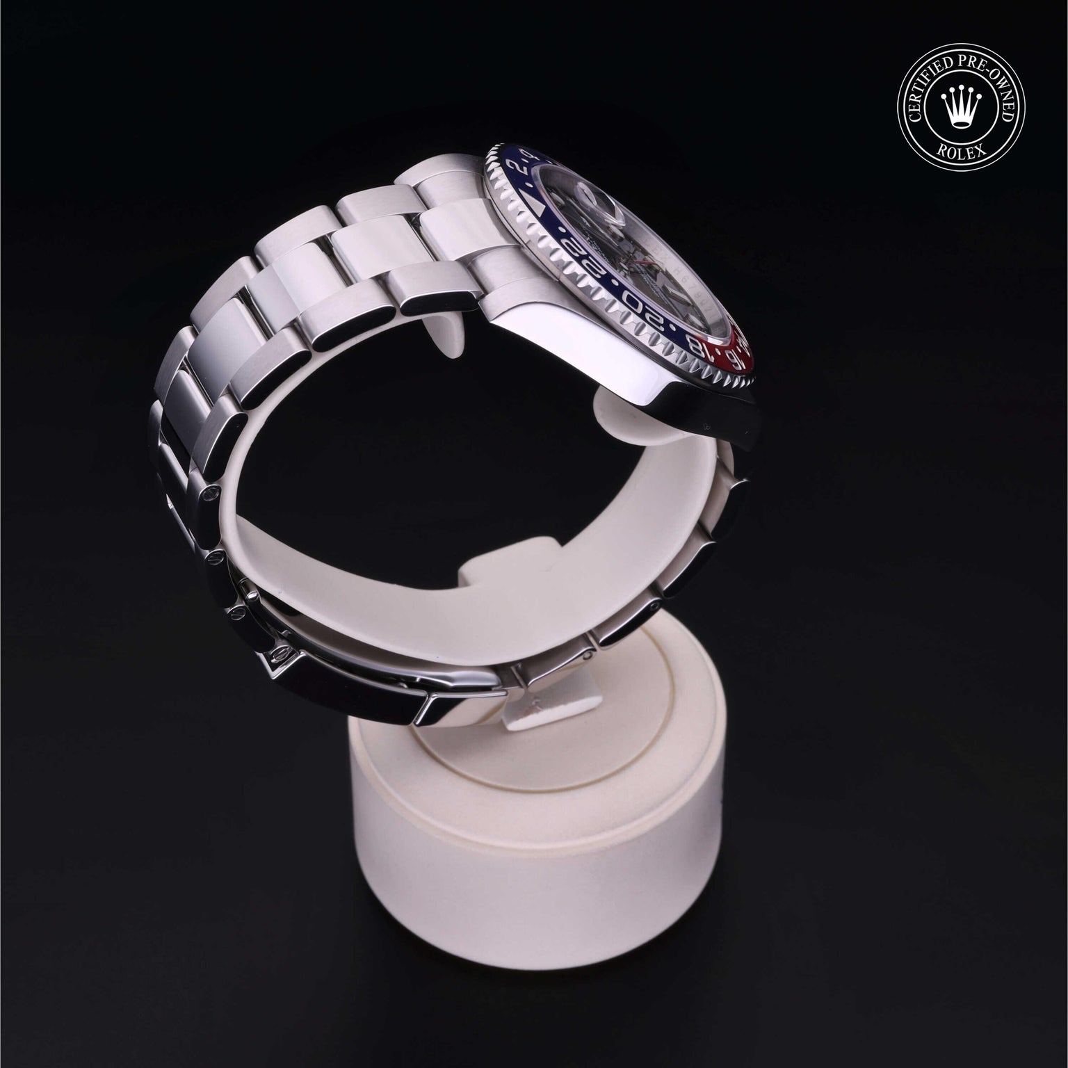 Rolex Certified Pre-owned GMT II M126710BLRO-0001 front on black background