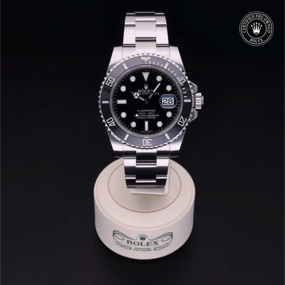 Rolex Certified Pre-owned Submariner M116610LN-0001 front on black background