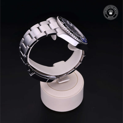 Rolex Certified Pre-owned GMT M126710BLNR-0003 front on black background