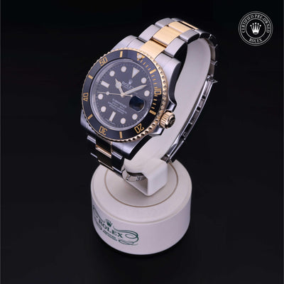 Rolex Certified Pre-owned Submariner M116613LN-0001 front on black background