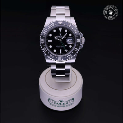 Rolex Certified Pre-owned GMT M116710LN-0001 front on black background