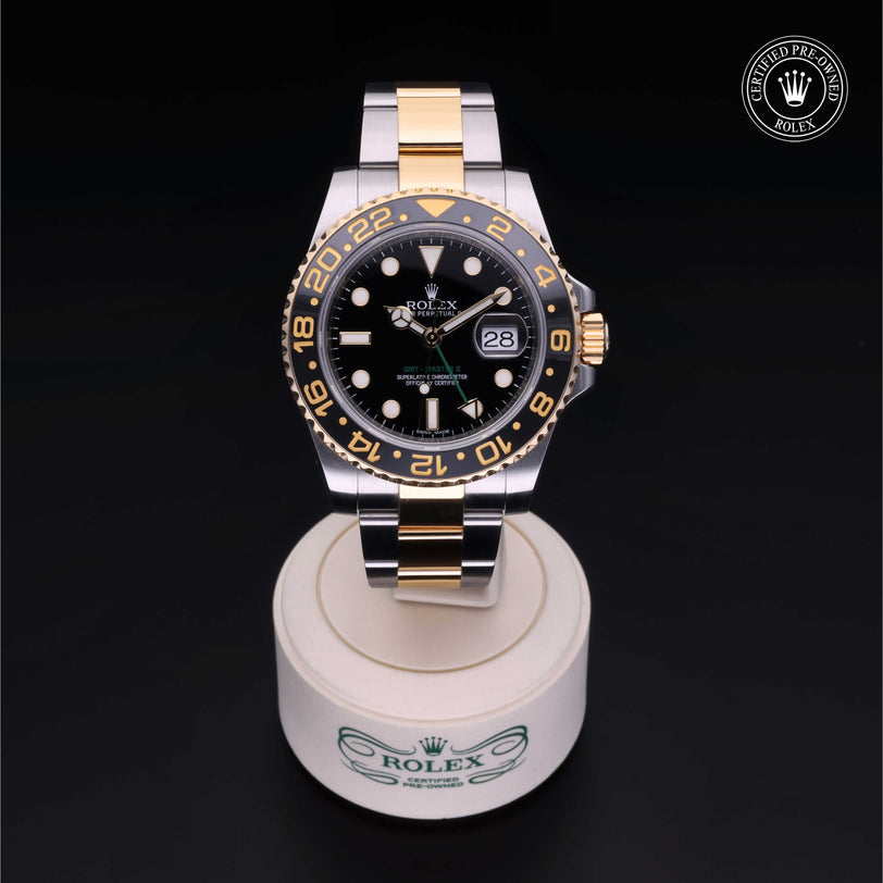 Rolex Certified Pre-owned GMT II M116713LN-0001 front on black background