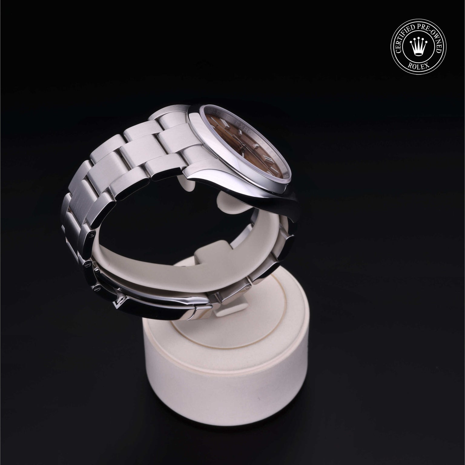 Rolex Certified Pre-owned Oyster Perpetual M116000-0011 front on black background