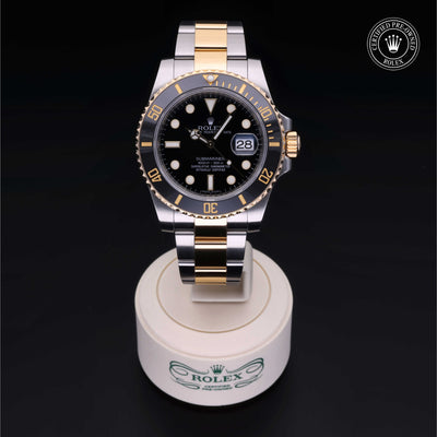 Rolex Certified Pre-owned Submariner Date M116613LN-0001 front on black background