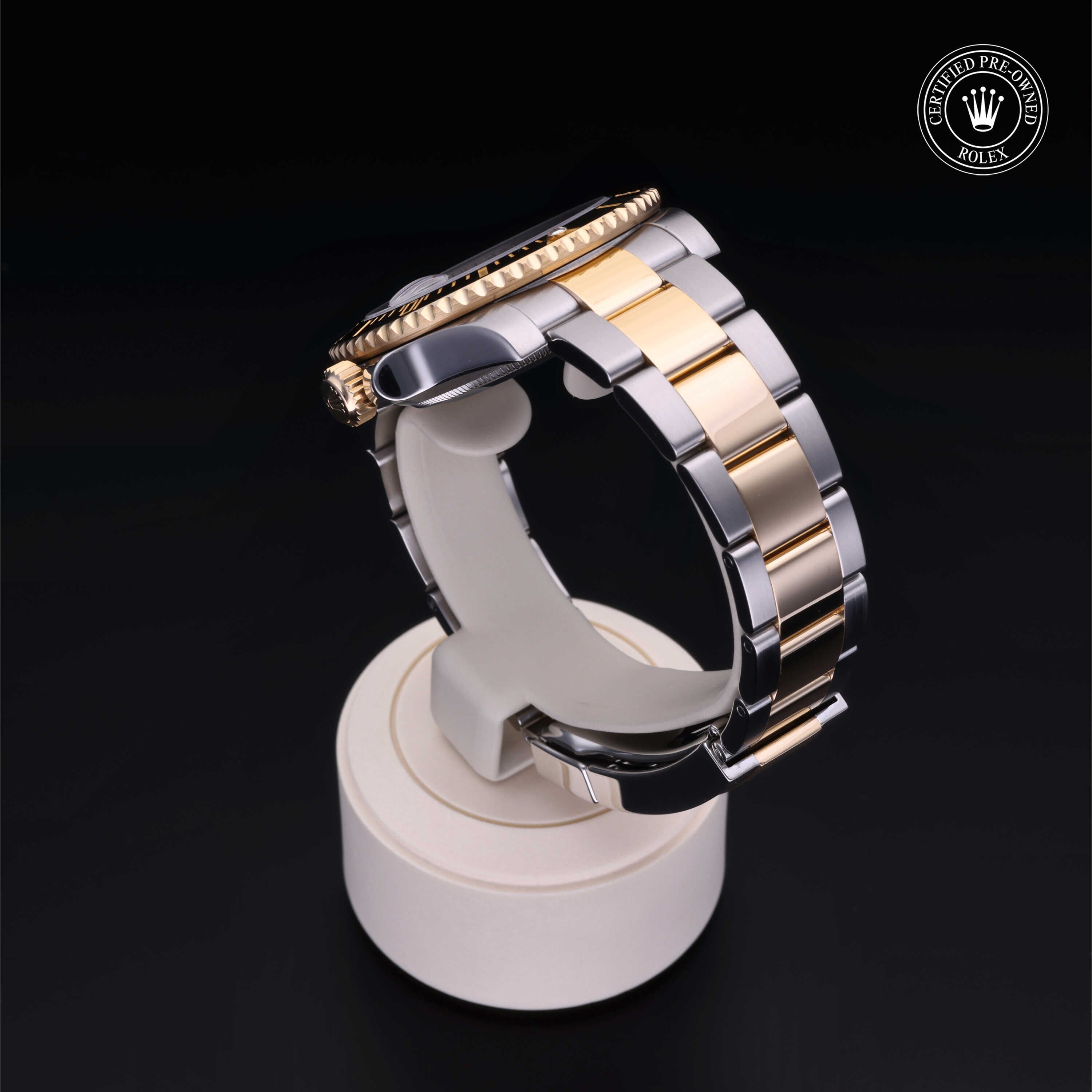 Rolex Certified Pre-owned Submariner Date M116613LN-0001 front on black background