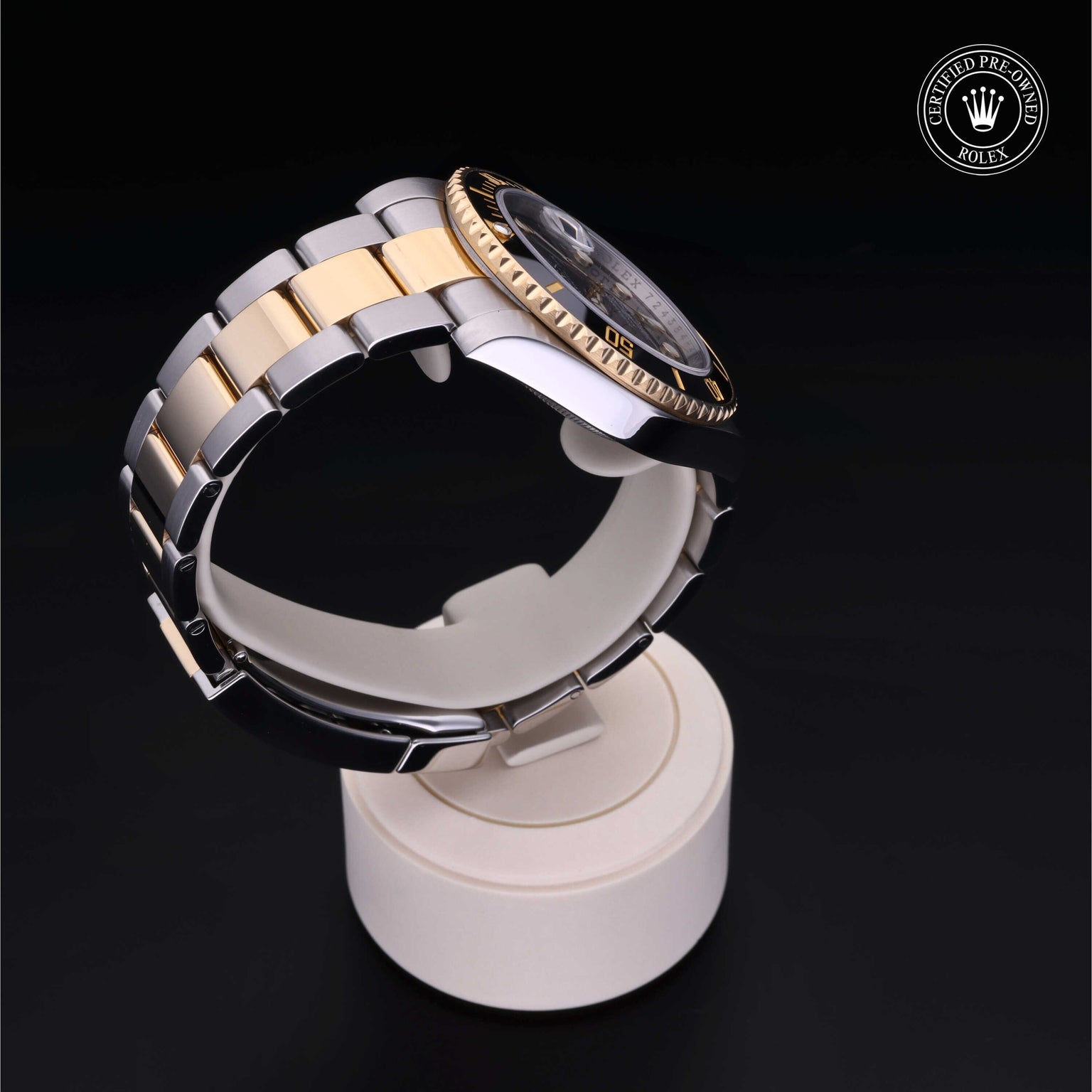 Rolex Certified Pre-owned Submariner Date M116613LN-0001 front on black background