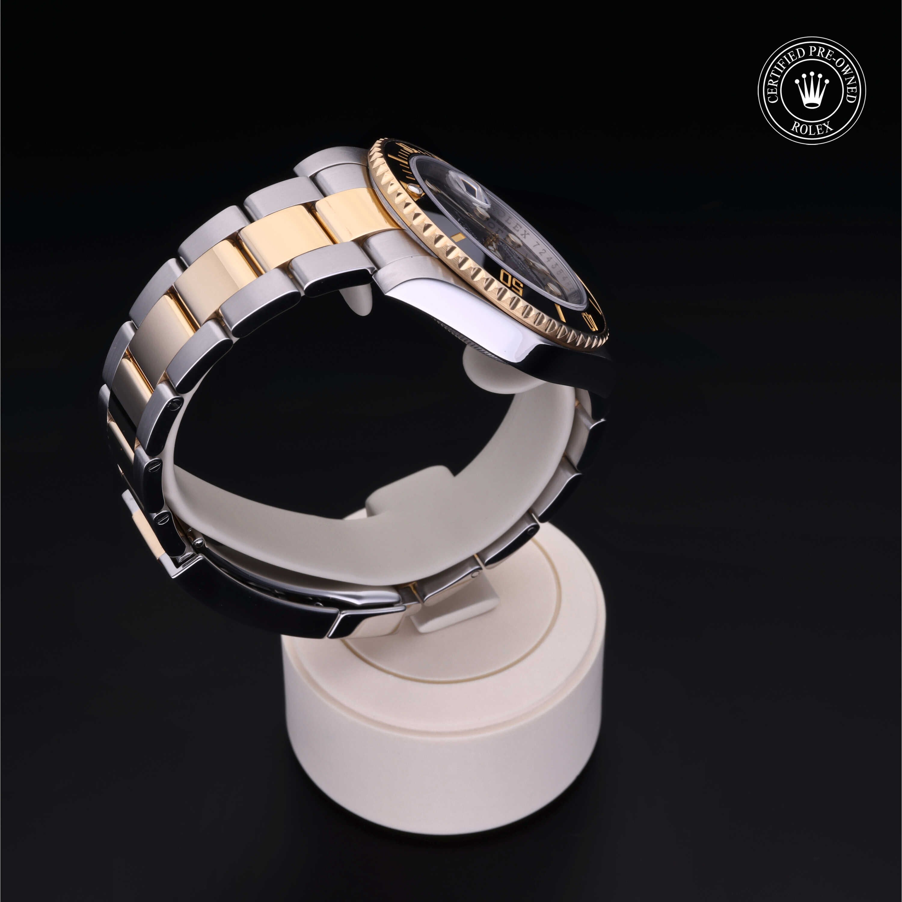 Rolex Certified Pre-owned Submariner Date M116613LN-0001 front on black background