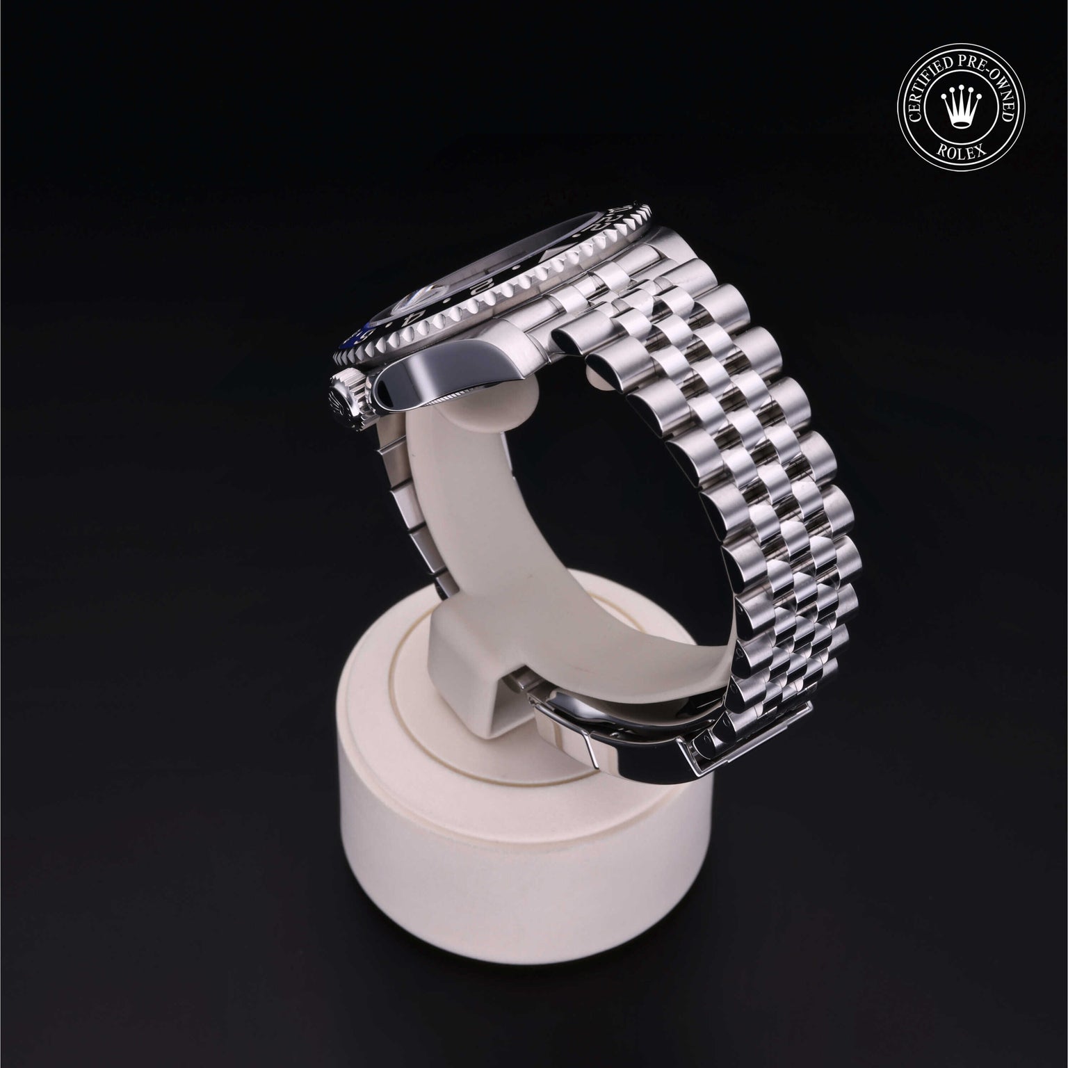 Rolex Certified Pre-owned GMT II M126710BLNR-0002 front on black background