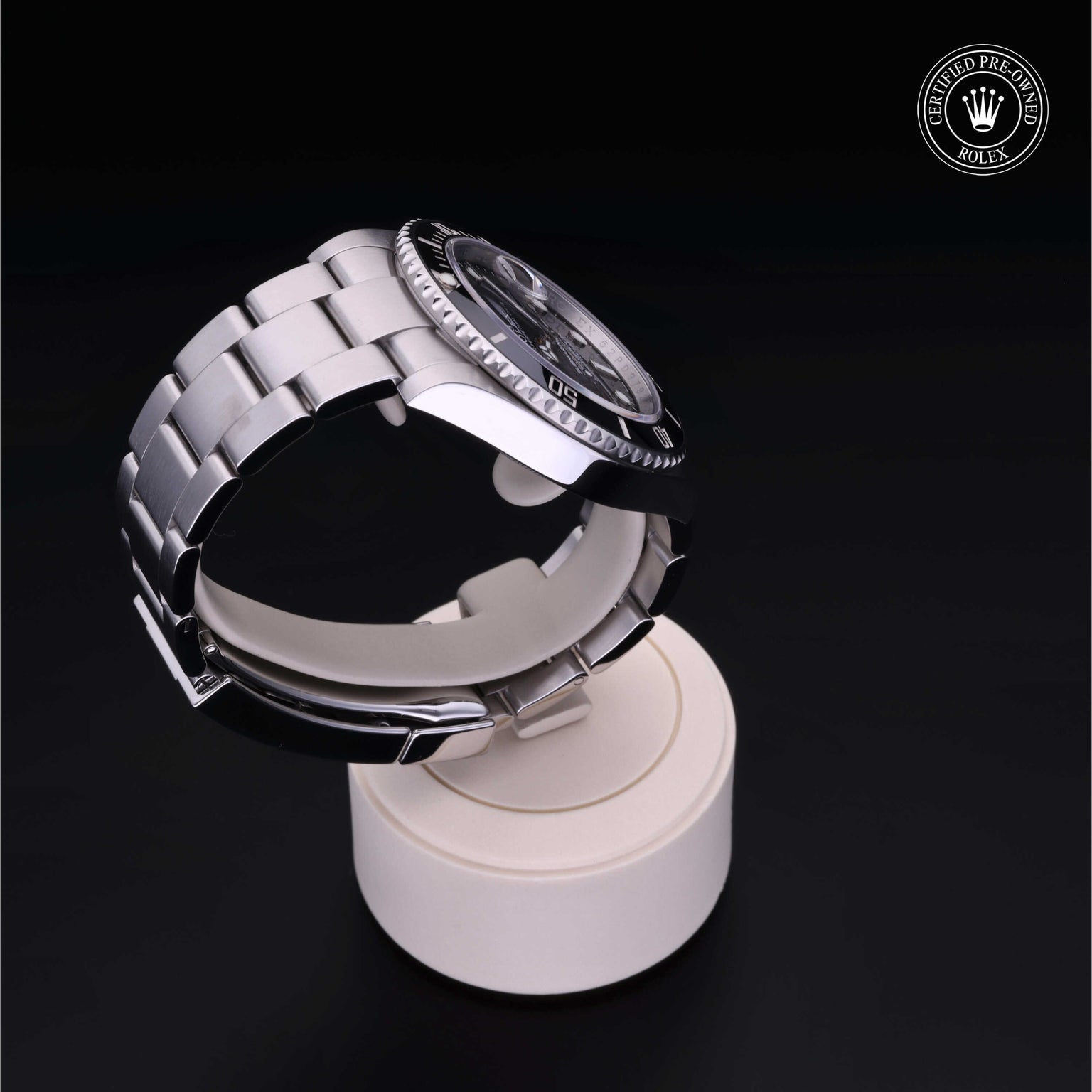 Rolex Certified Pre-owned Submariner Date M126610LN-0001 front on black background
