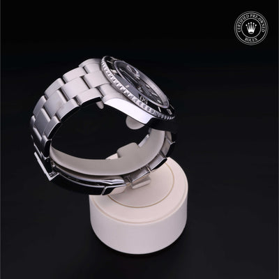 Rolex Certified Pre-owned Submariner Date M126610LN-0001 front on black background
