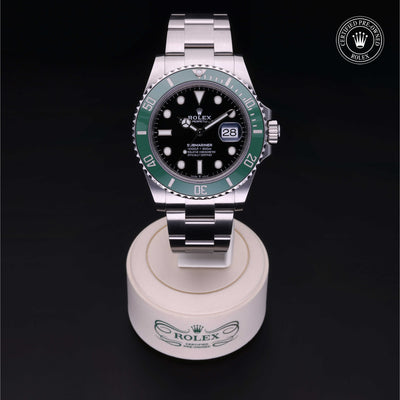 Rolex Certified Pre-owned Submariner M126610LV-0002 front on black background