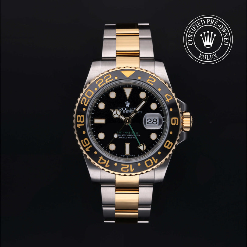 Rolex Certified Pre-owned GMT II M116713LN-0001 front on black background