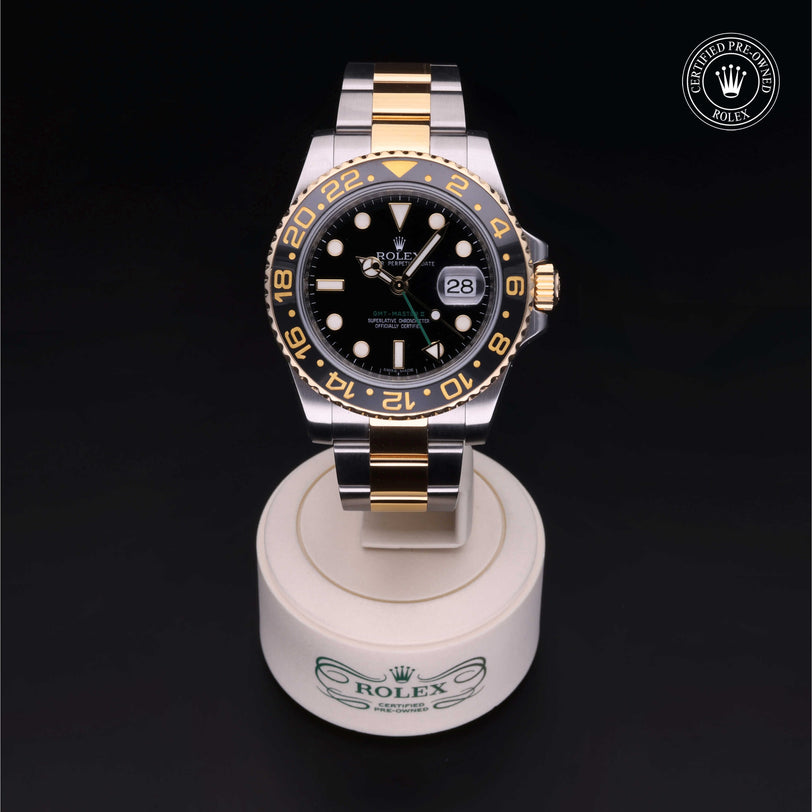 Rolex Certified Pre-owned GMT II M116713LN-0001 front on black background
