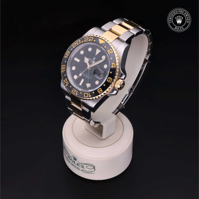 Rolex Certified Pre-owned GMT II M116713LN-0001 front on black background