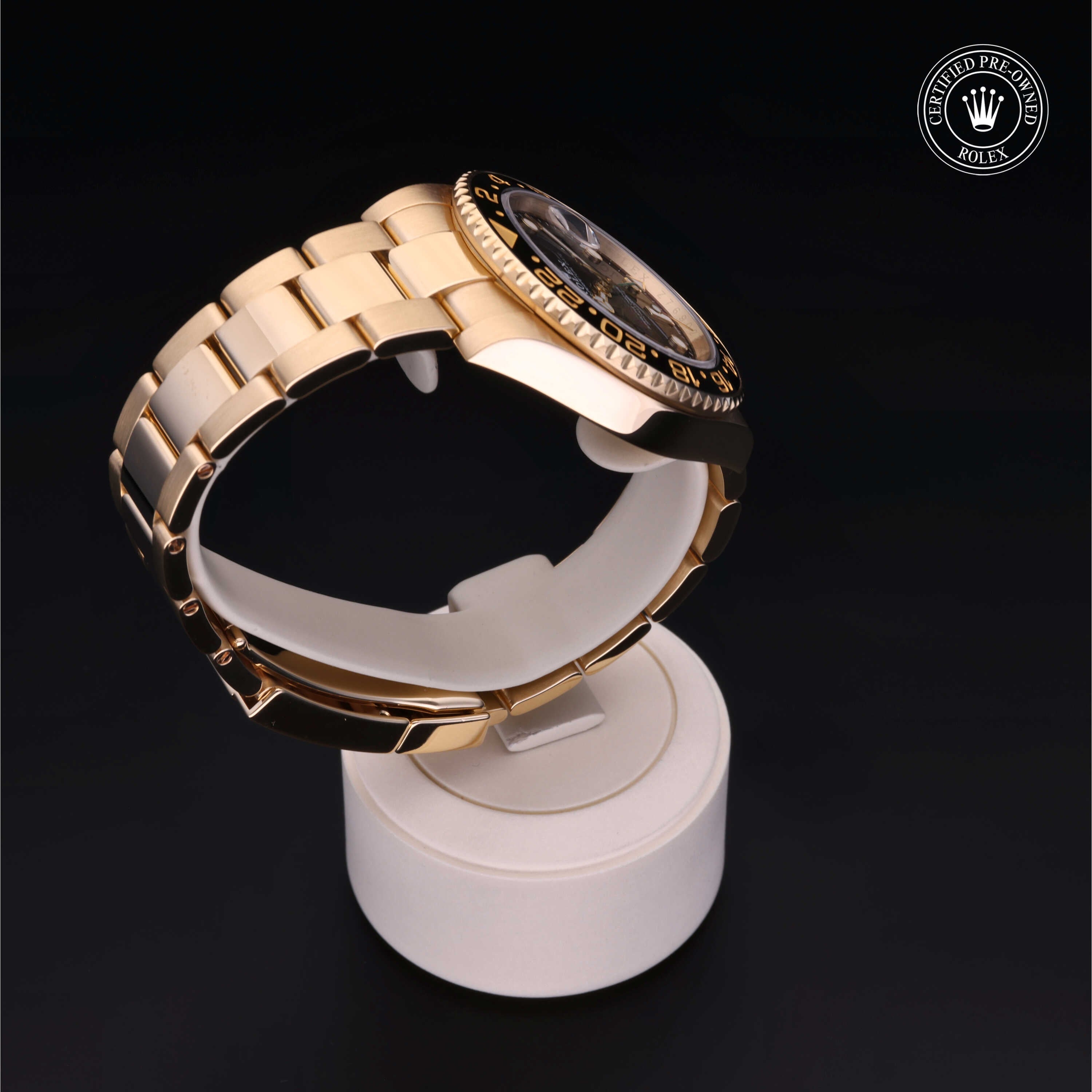 Rolex Certified Pre-owned GMT II M116718LN-0002 front on black background