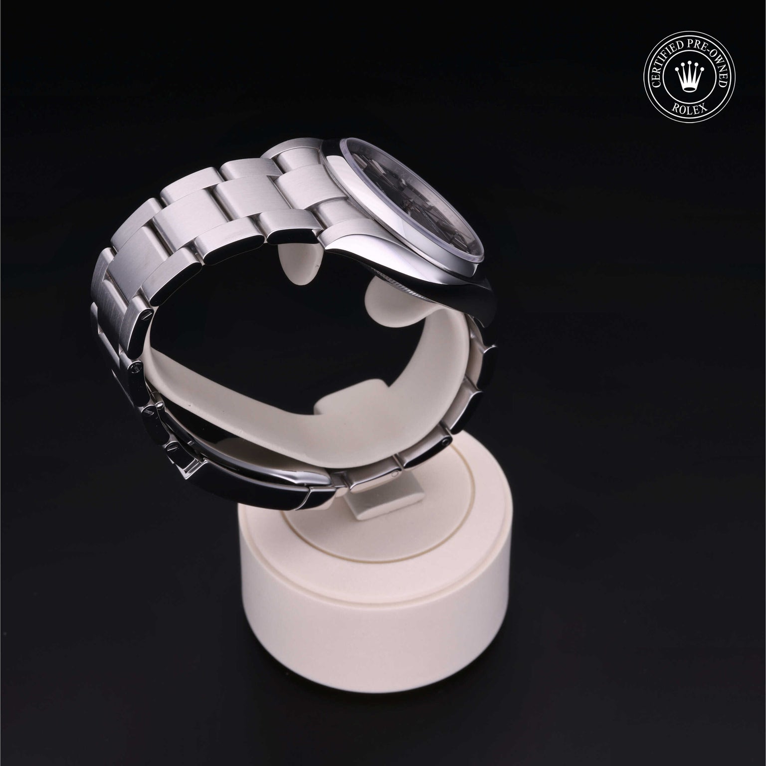 Rolex Certified Pre-owned Oyster Perpetual M114200-0023 front on black background