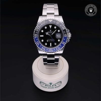 Rolex Certified Pre-owned GMT M116710BLNR-0002 front on black background