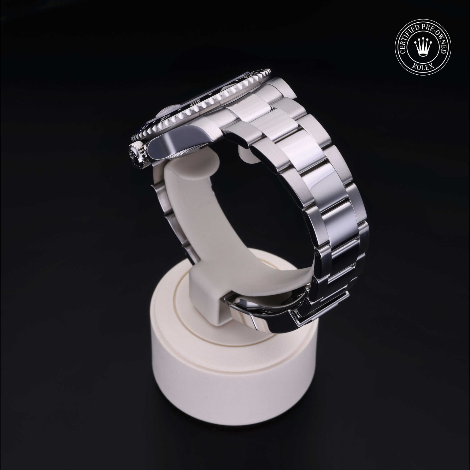 Rolex Certified Pre-owned GMT M116710BLNR-0002 front on black background