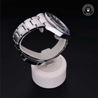 Rolex Certified Pre-owned GMT M116710BLNR-0002 front on black background