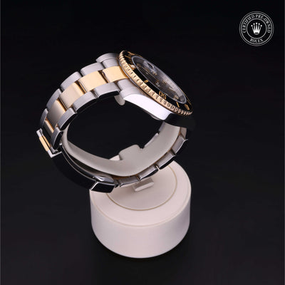 Rolex Certified Pre-owned Submariner Date M116613LN-0003 front on black background