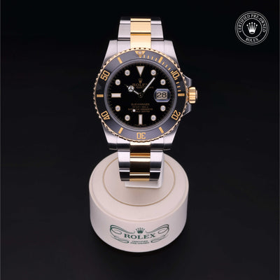 Rolex Certified Pre-owned Submariner Date M116613LN-0003 front on black background