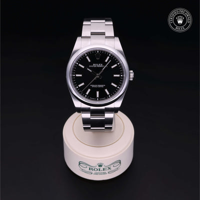 Rolex Certified Pre-owned Oyster Perpetual M114300-0005 front on black background