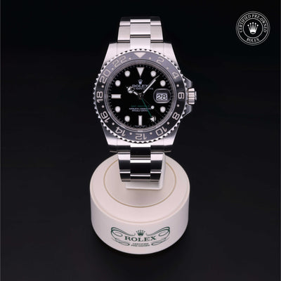 Rolex Certified Pre-owned GMT M116710LN-0001 front on black background