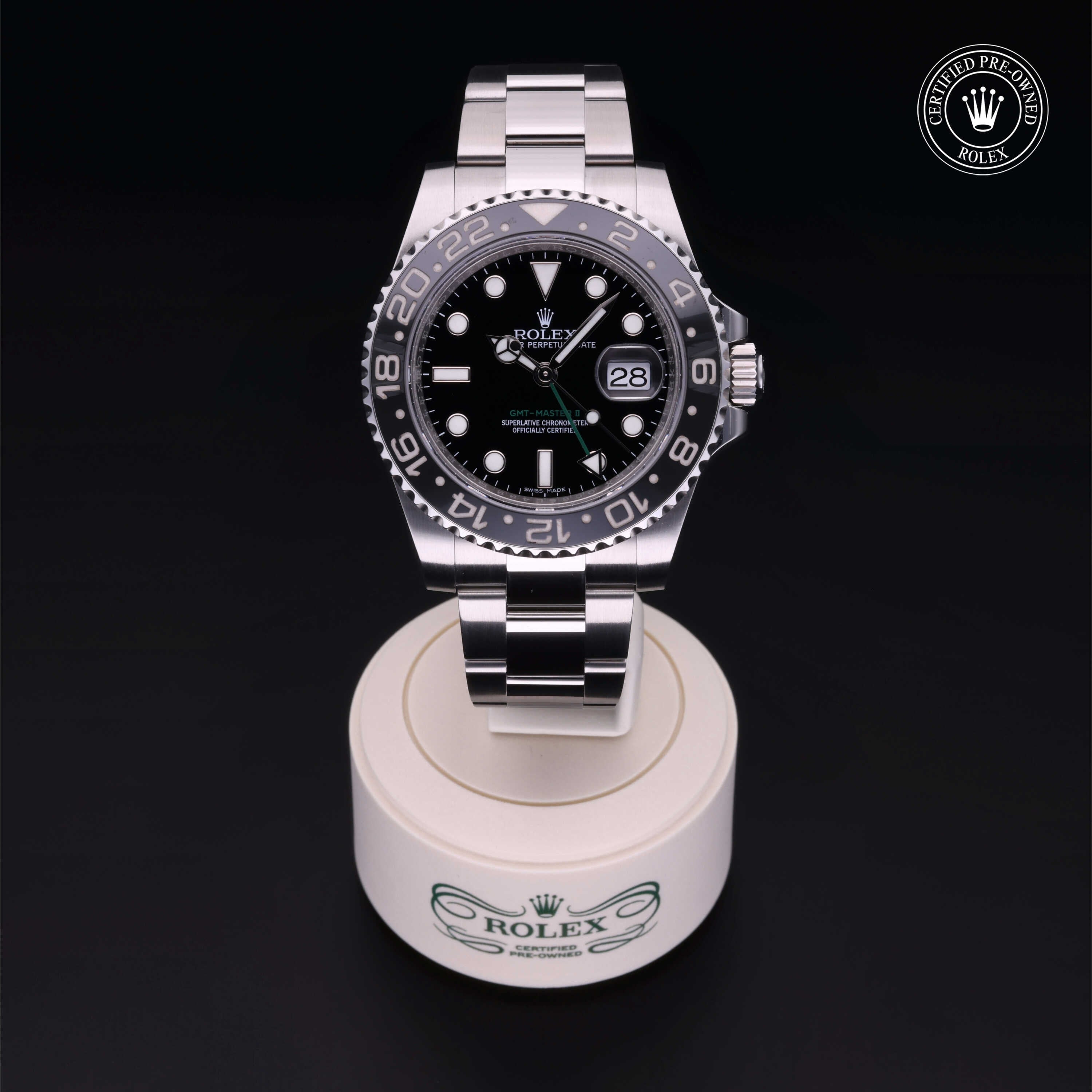 Rolex Certified Pre-owned GMT M116710LN-0001 front on black background