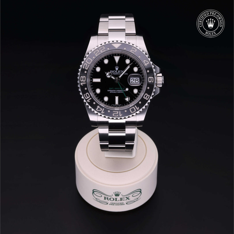 Rolex Certified Pre-owned GMT M116710LN-0001 front on black background
