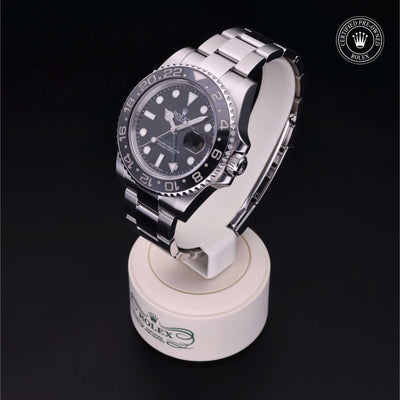 Rolex Certified Pre-owned GMT M116710LN-0001 front on black background