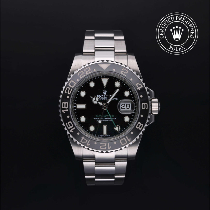 Rolex Certified Pre-owned GMT II M116710LN-0001 front on black background