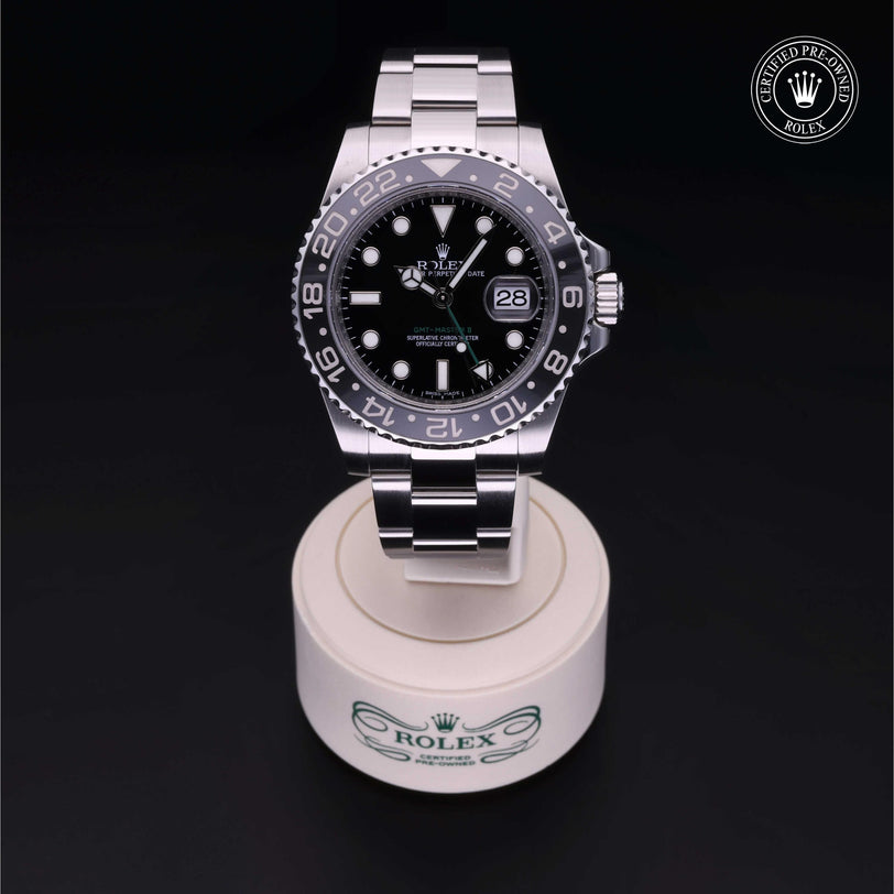 Rolex Certified Pre-owned GMT II M116710LN-0001 front on black background