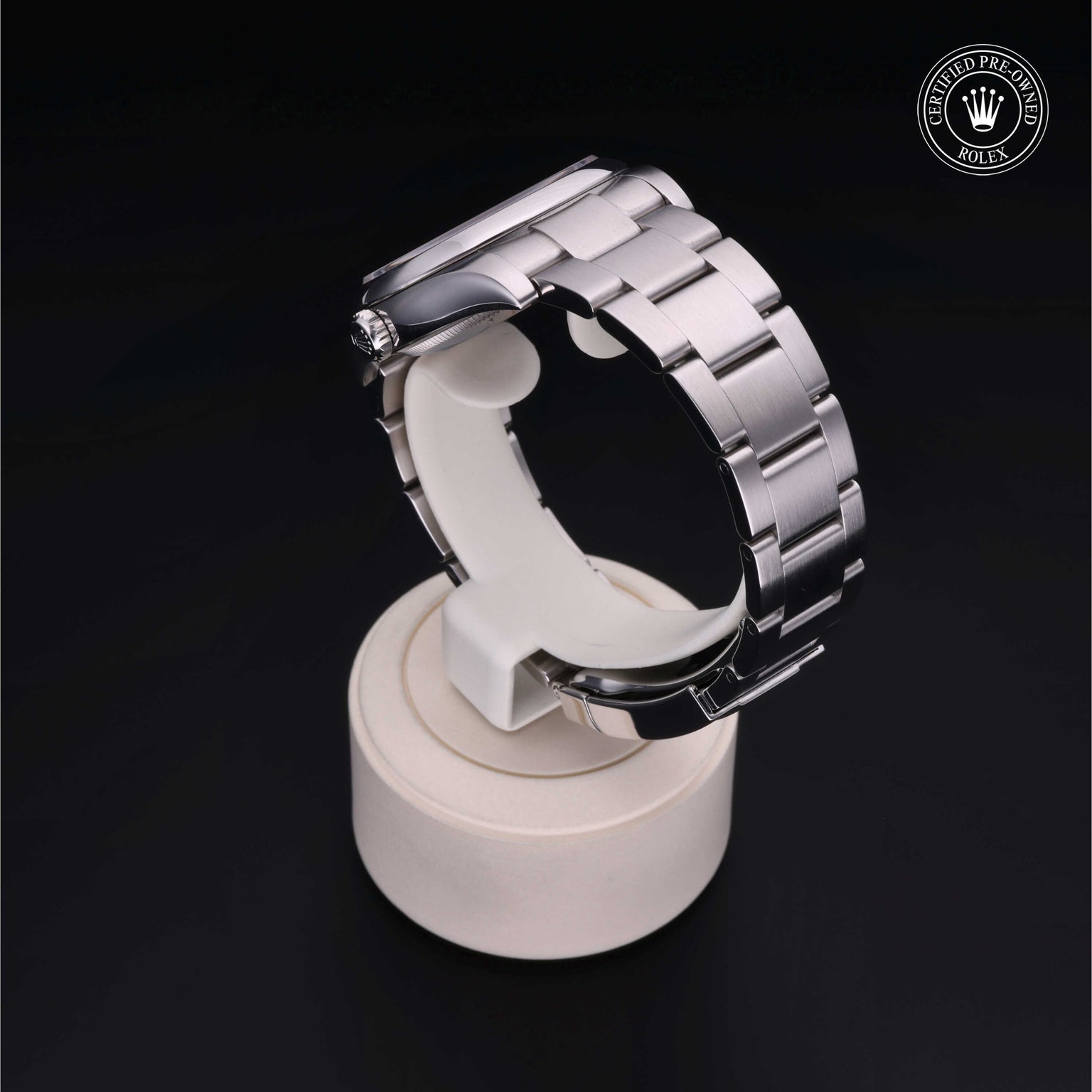 Rolex Certified Pre-owned Oyster Perpetual M116000-0011 front on black background