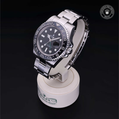 Rolex Certified Pre-owned GMT II M116710LN-0001 front on black background