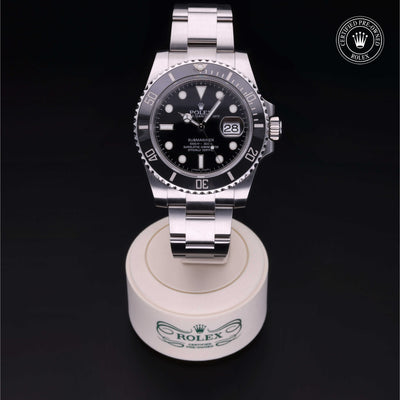 Rolex Certified Pre-owned Submariner Date M116610LN-0001 front on black background