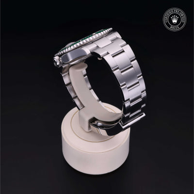Rolex Certified Pre-owned Submariner Date M126610LV-0002 front on black background