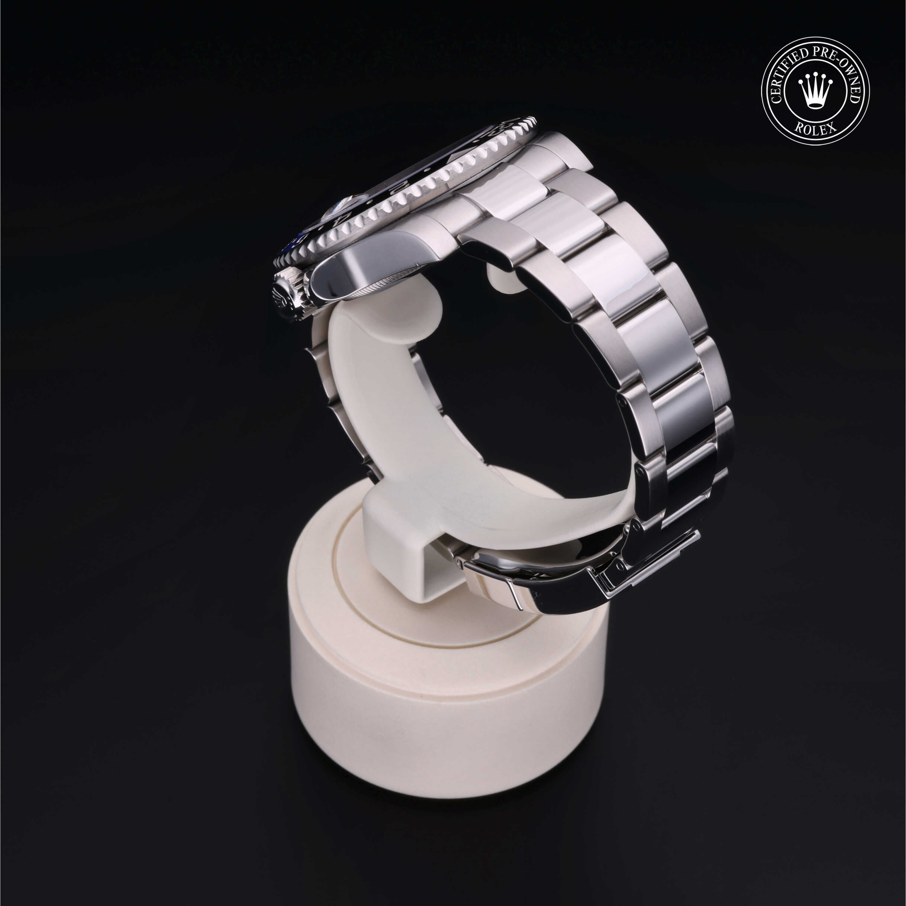 Rolex Certified Pre-owned GMT M116710BLNR-0002 front on black background