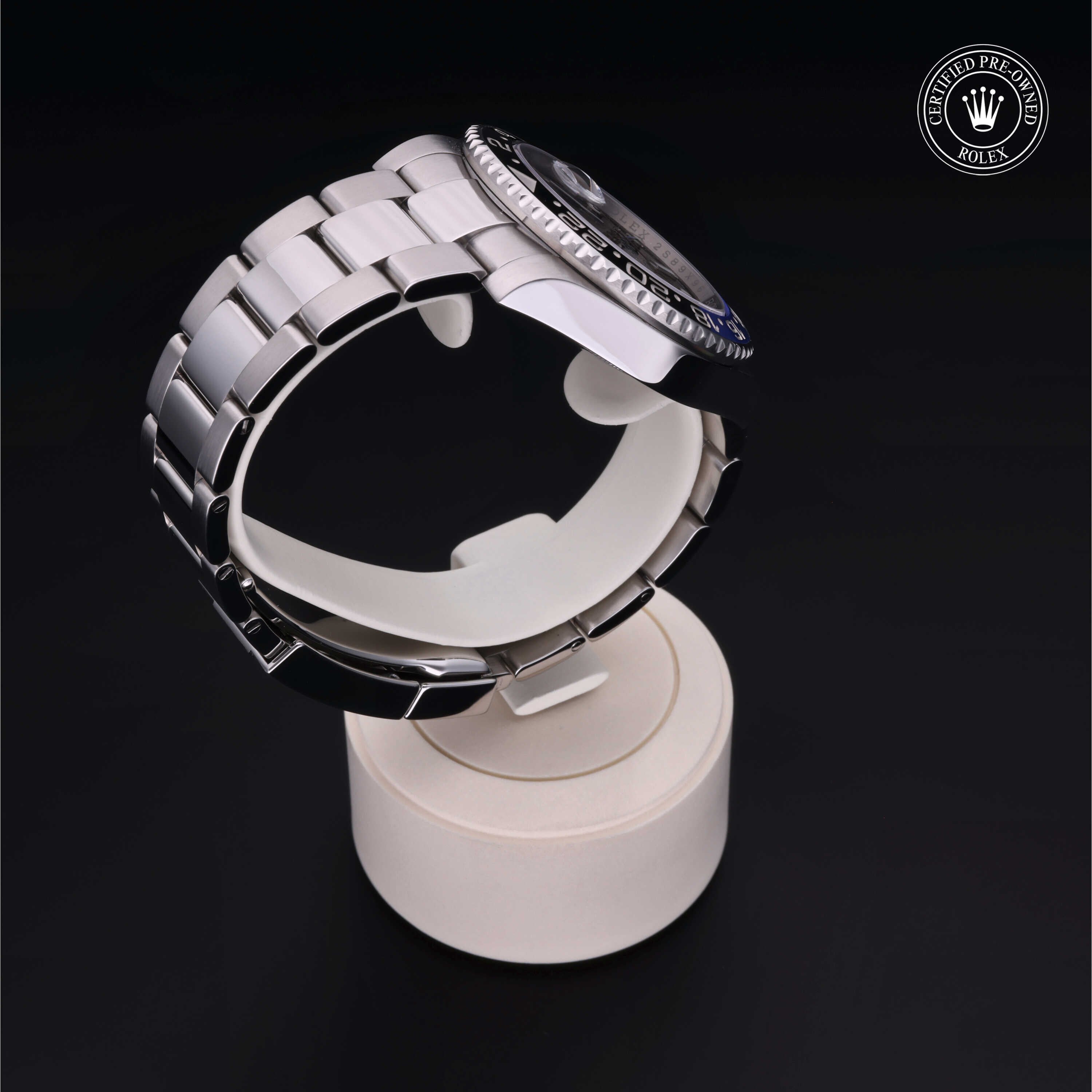 Rolex Certified Pre-owned GMT M116710BLNR-0002 front on black background