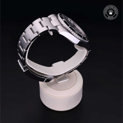 Rolex Certified Pre-owned Submariner M116610LN-0001 front on black background