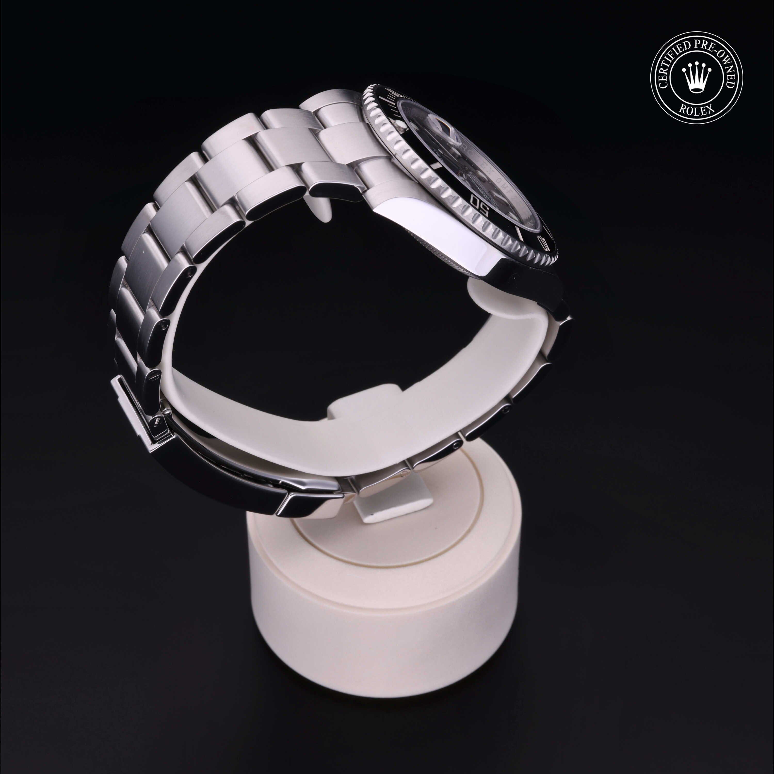 Rolex Certified Pre-owned Submariner M116610LN-0001 front on black background